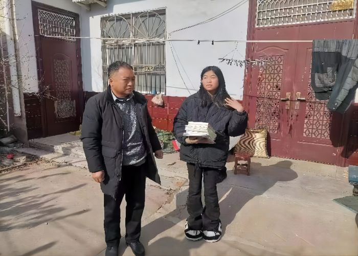 張建平：愛心助困，情滿寒冬